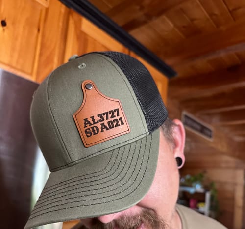 Customer photo review of Ear Tag Custom Leather Patch Trucker Hat - Richardson 112