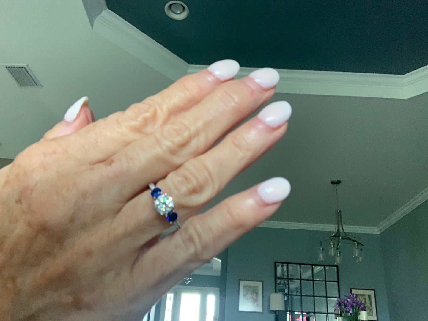 Customer photo review of Three Stone Moissanite and Blue Sapphire Pave Engagement Ring