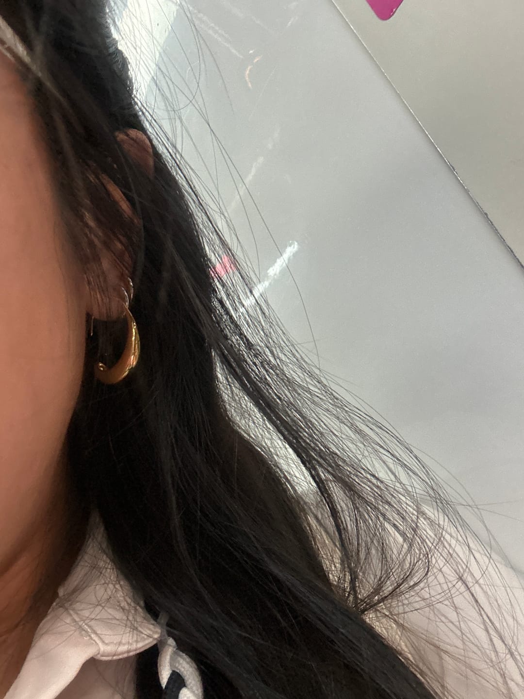 Customer photo review of Classic Drop Hoop Earrings