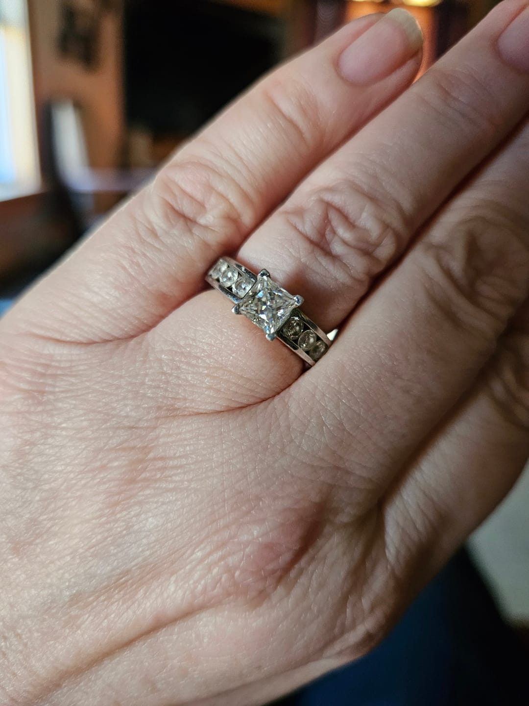 Customer photo review of Princess Cut Moissanite With Round Channel Set Engagement Ring