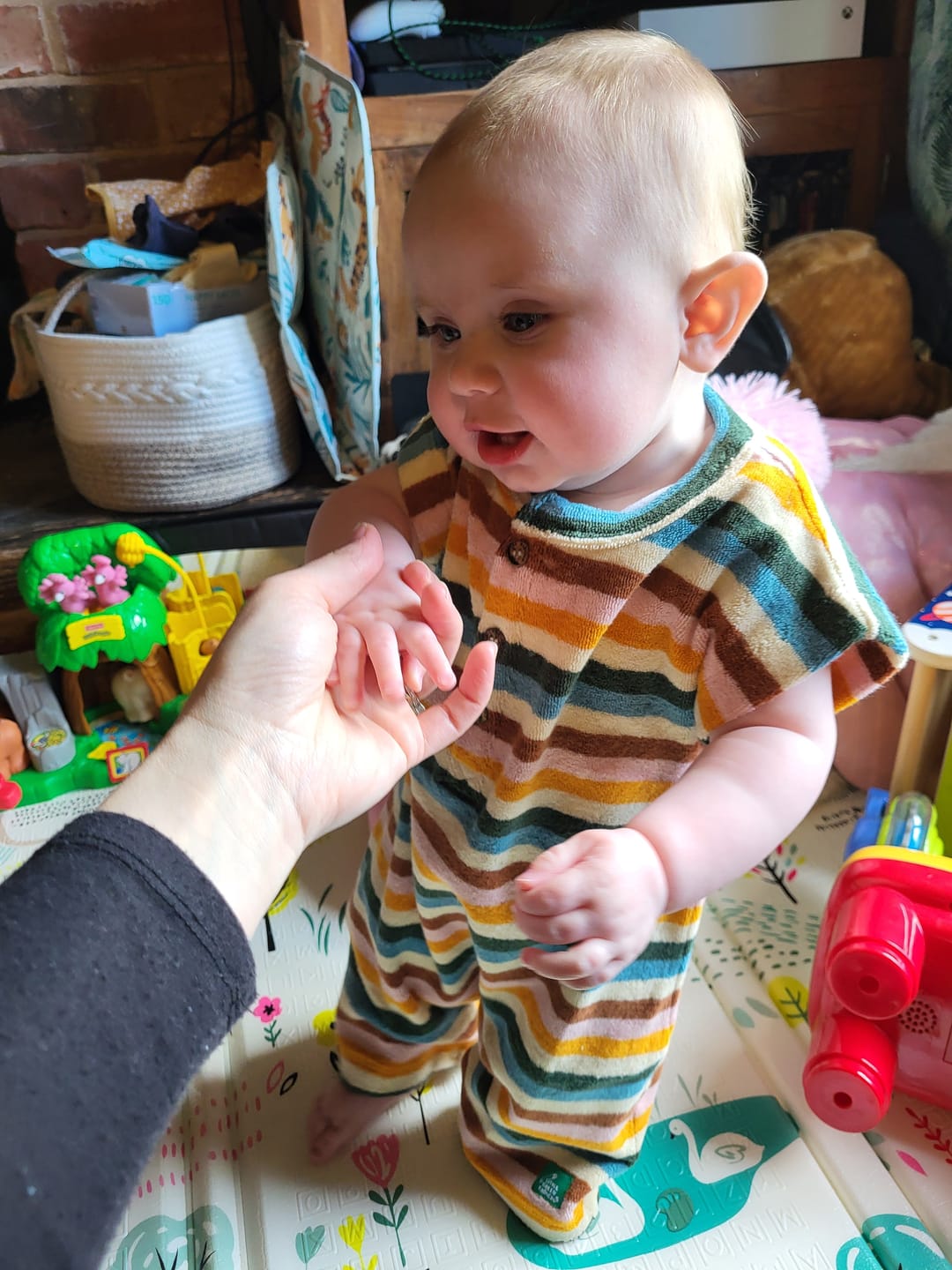 Customer photo review of Rainbow Striped Towelling Romper