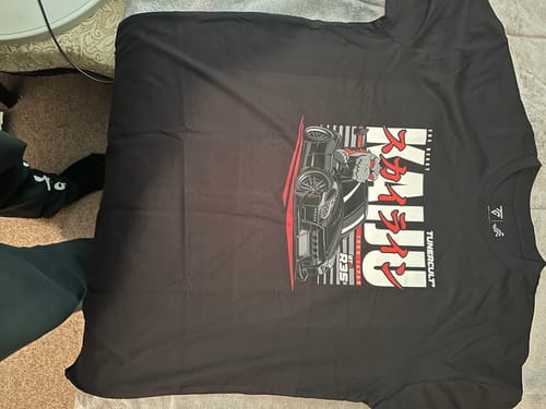 Customer photo review of MYSTERY TEE