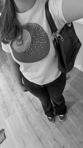 Customer photo review of 'Lucky Shot' baby tee