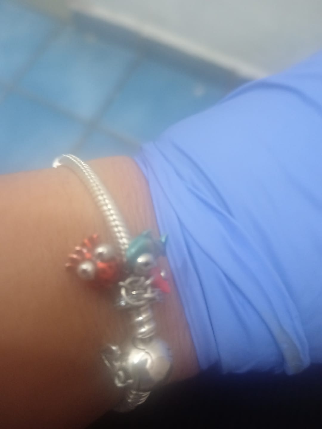 Customer photo review of Pulsera Esfera del Amor
