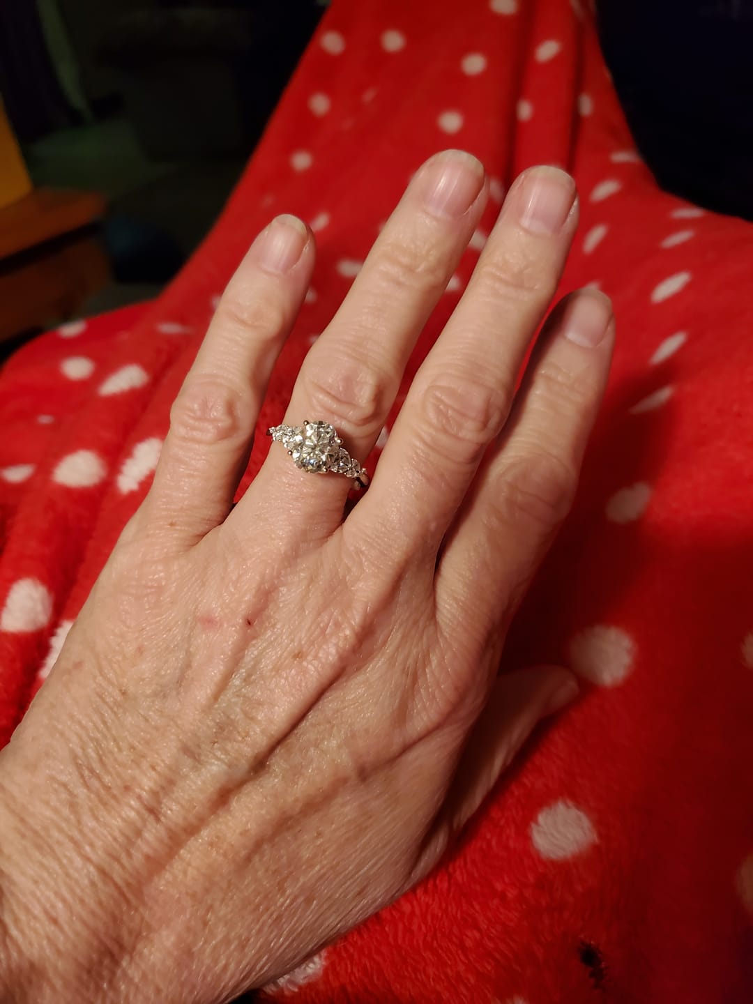 Customer photo review of Oval Cut Moissanite With Marquise Cluster Engagement Ring