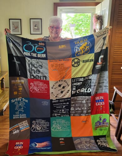 T-shirt quilt with biking, fundraising themes by Teresa from NC