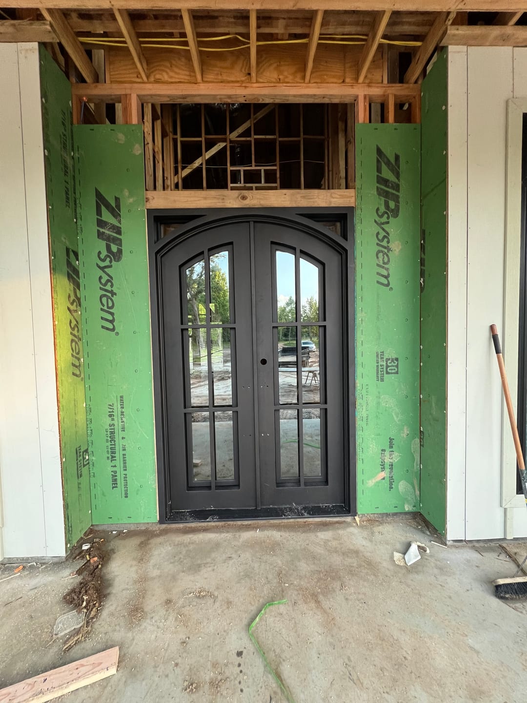 Customer photo review of Covington Model Double Front Entry Iron Door With Tempered Low E Clear Glass Dark Bronze Finish