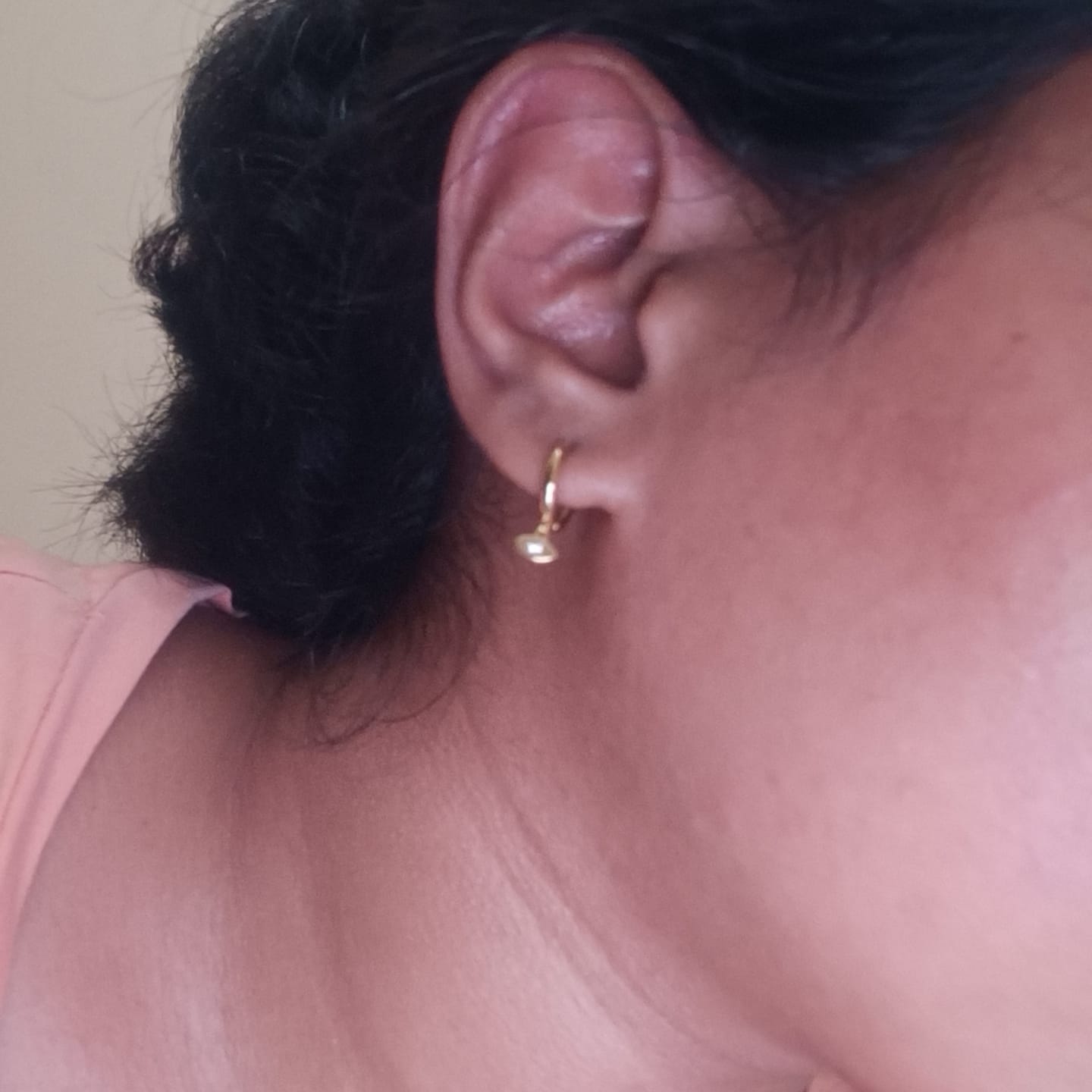 Customer photo review of Tiny Iris Star Hoop Earrings