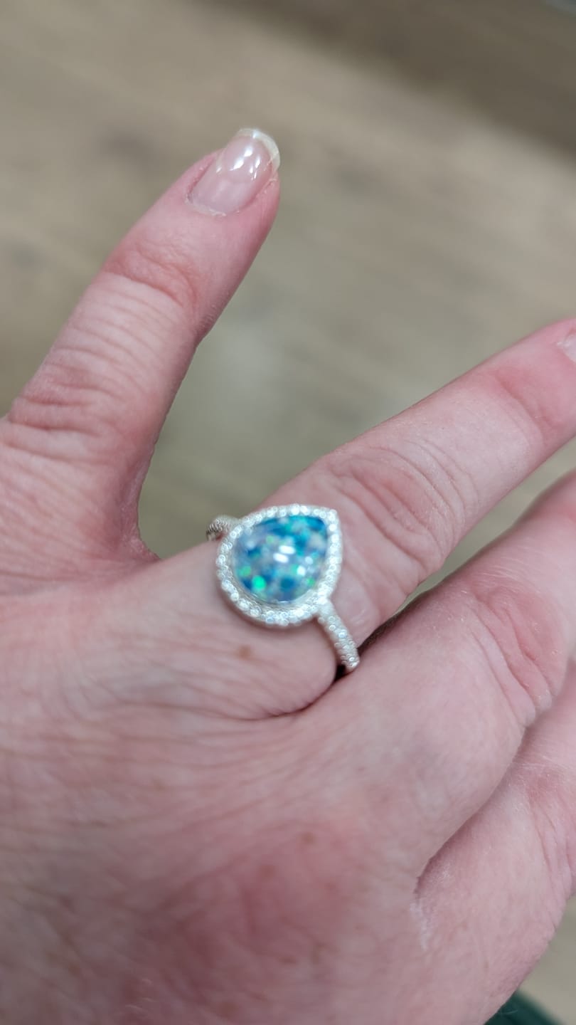 Customer photo review of Bedazzled Pear Opal Ring with Cremation Ashes