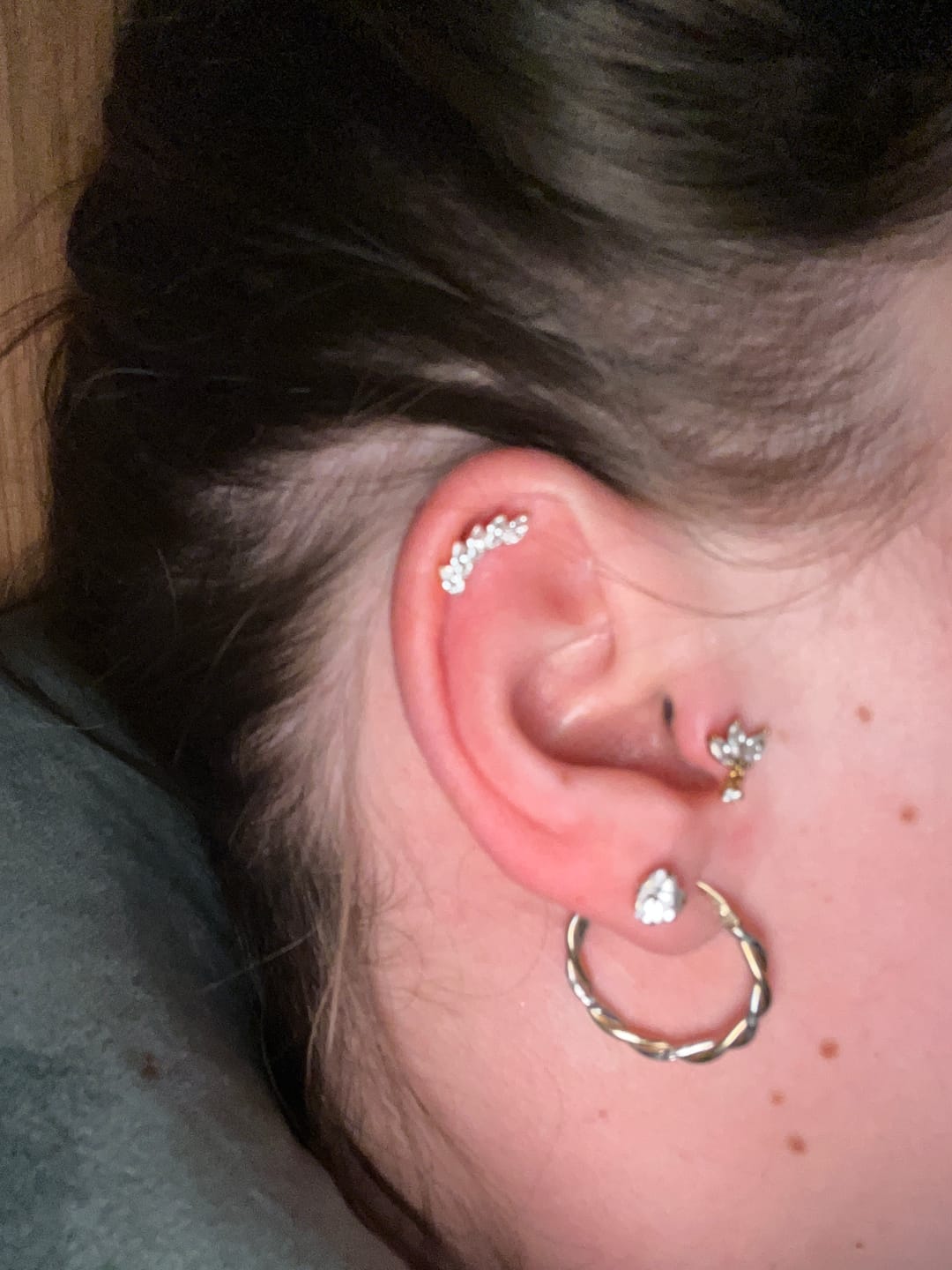 Customer photo review of Feather Piercing | Titan