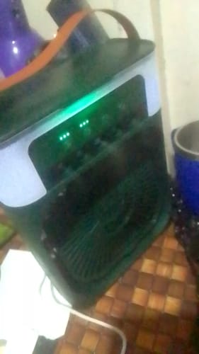 Customer photo review of Mini Portable Fan Air Cooling fan Humidifier Purifier Mist Cooler with 7 Colors LED Light