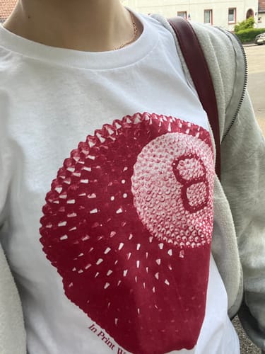 Customer photo review of 'Lucky Shot' baby tee