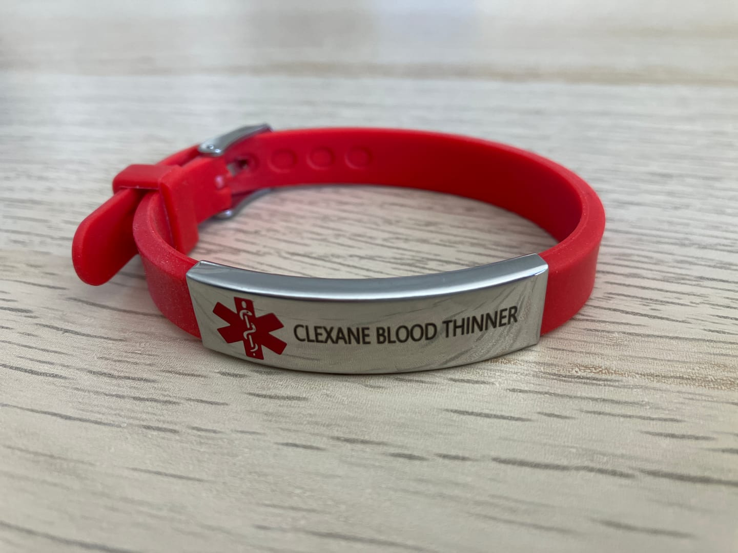 Customer photo review of Personalised Red Silicone Medical Alert ID Bracelet