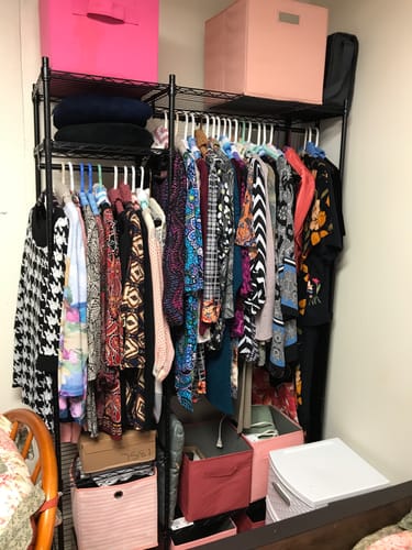 Customer photo review of Raybee Heavy Duty Portable Closet, Wire Garment Rack on wheels, Adjustable Hanging Clothes Rack, For Bedroom