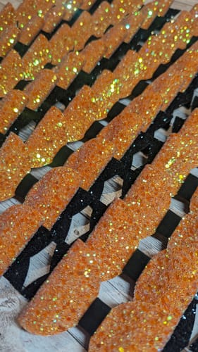 Jenny S. review of Sunset Orange Fairytales Lux Premium Chunky Glitter Fabric image 1 out of 1