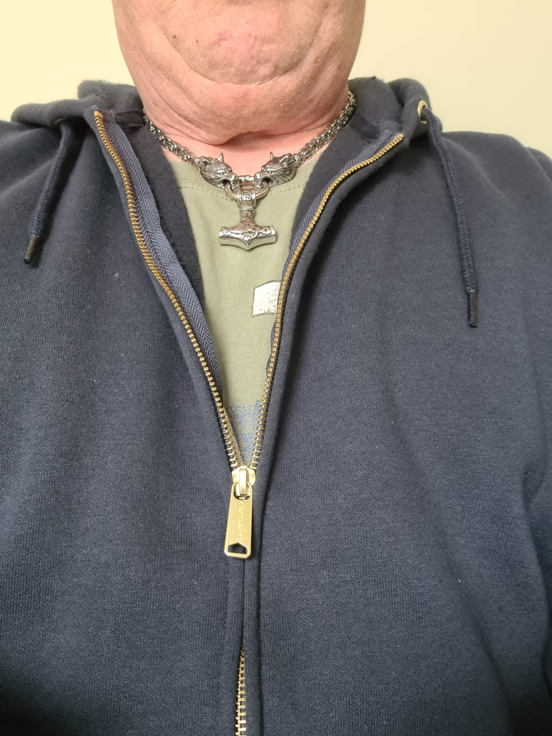 Customer photo review of Viking Wolf Head Necklace with Thor's Hammer Pendant