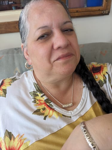 Customer photo review of Sterling Silver Cut Out Hawaiian Scroll Tube Slider Pendant (Chain Sold Separately)