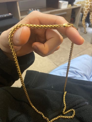 Reseña con foto de un cliente sobre Cadena Snake Oro