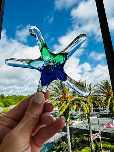 Customer photo review of Dichroic Starfish Suncatcher with Infused Cremains