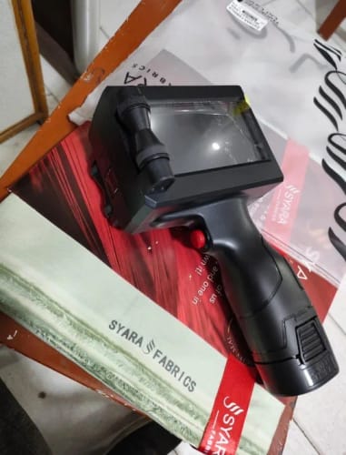 Customer photo review of The PrintPeak Handheld Inkjet Printer — for Multi-Surface Printing