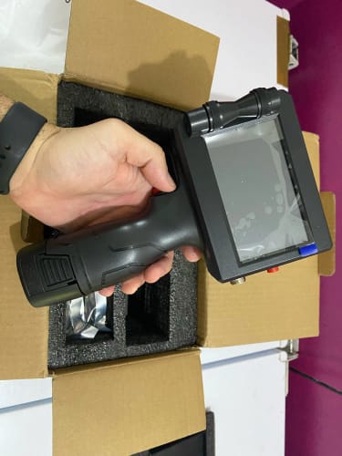 Customer photo review of The PrintPeak Handheld Inkjet Printer — for Multi-Surface Printing