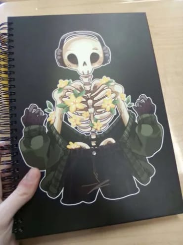 Customer photo review of Chilling Skeleton with Flowers Notebook