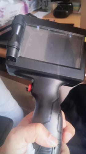 Customer photo review of The PrintPeak Handheld Inkjet Printer — for Multi-Surface Printing