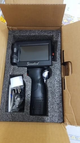 Customer photo review of The PrintPeak Handheld Inkjet Printer — for Multi-Surface Printing