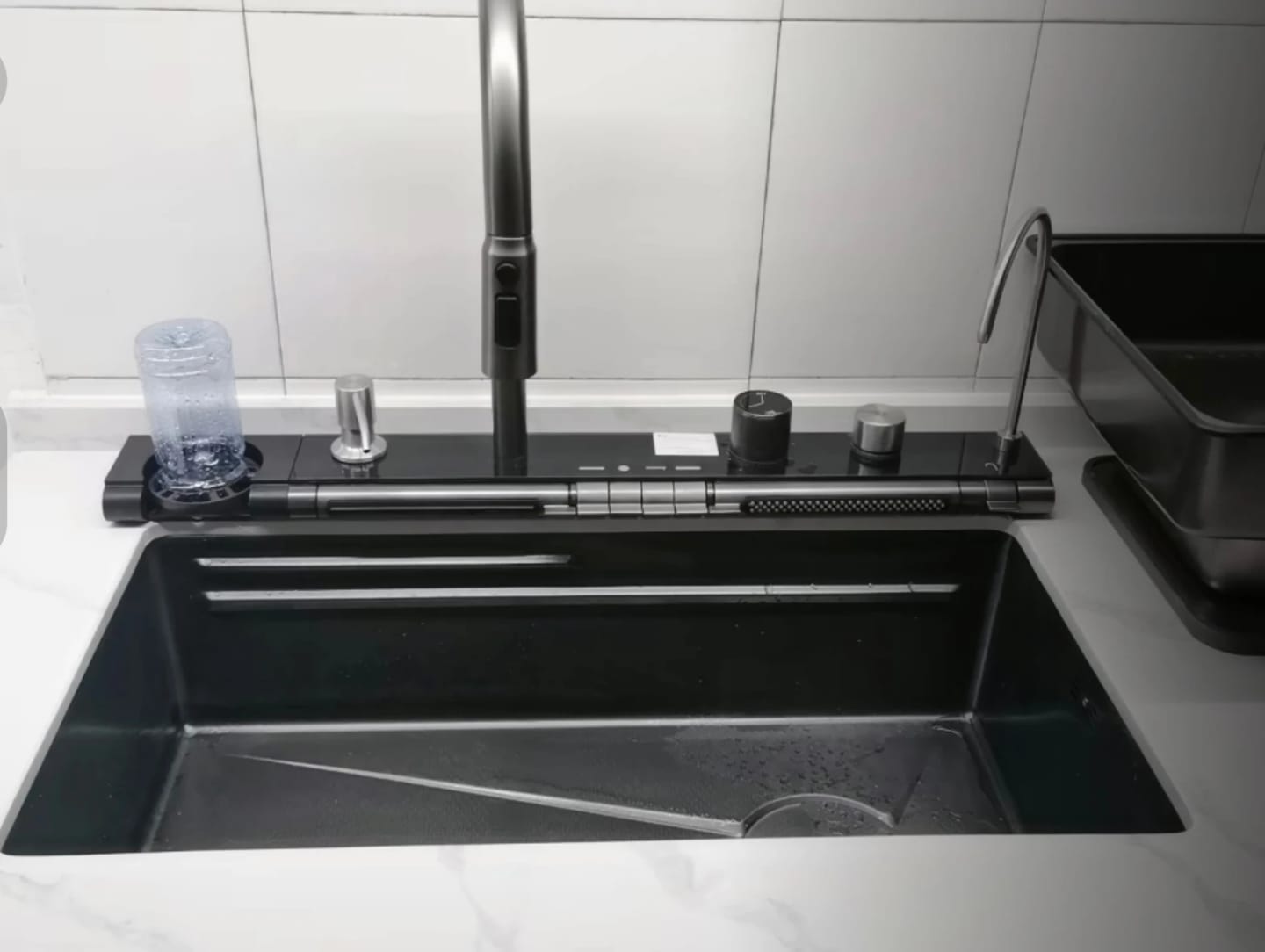 Customer photo review of Stainless Steel Waterfall Kitchen Sink with Embossed Digital Display, Large Single Slot, All-in-One Faucet, and Multi-Functional Wash Basin