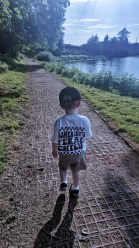 Customer photo review of Somebody's Feral Child Front & Back Graphic Tee