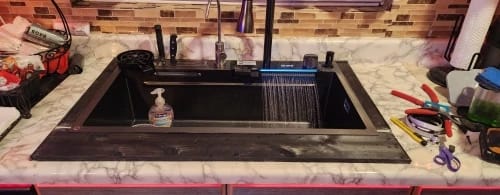 Customer photo review of Stainless Steel Kitchen Sink with Double Waterfall Design, Large Single Basin, Embossed Surface, and Ambient Light Digital Display