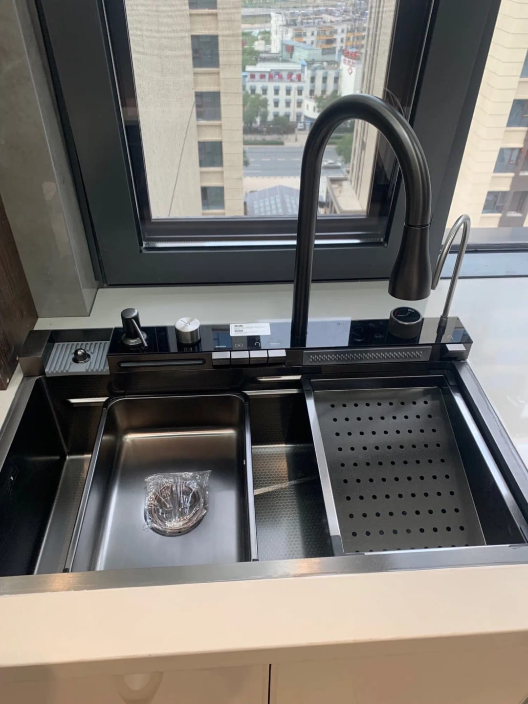 Customer photo review of Stainless Steel Waterfall Kitchen Sink with Embossed Digital Display, Large Single Slot, All-in-One Faucet, and Multi-Functional Wash Basin