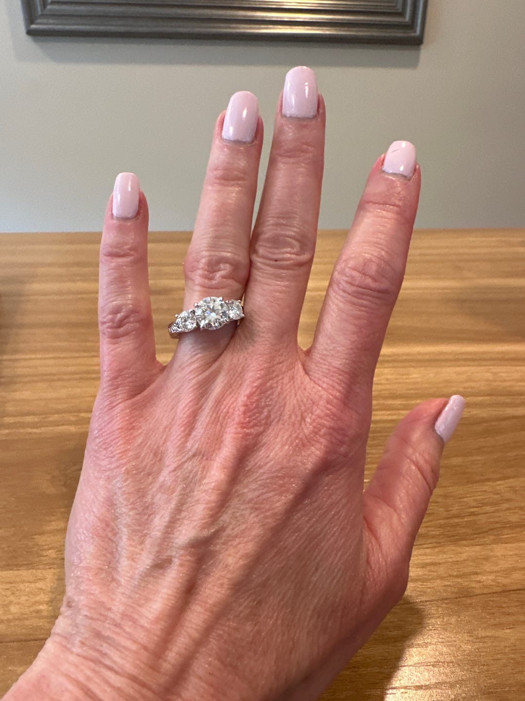 Customer photo review of Vintage Three Stone Moissanite Scroll Filigree Engagement Ring