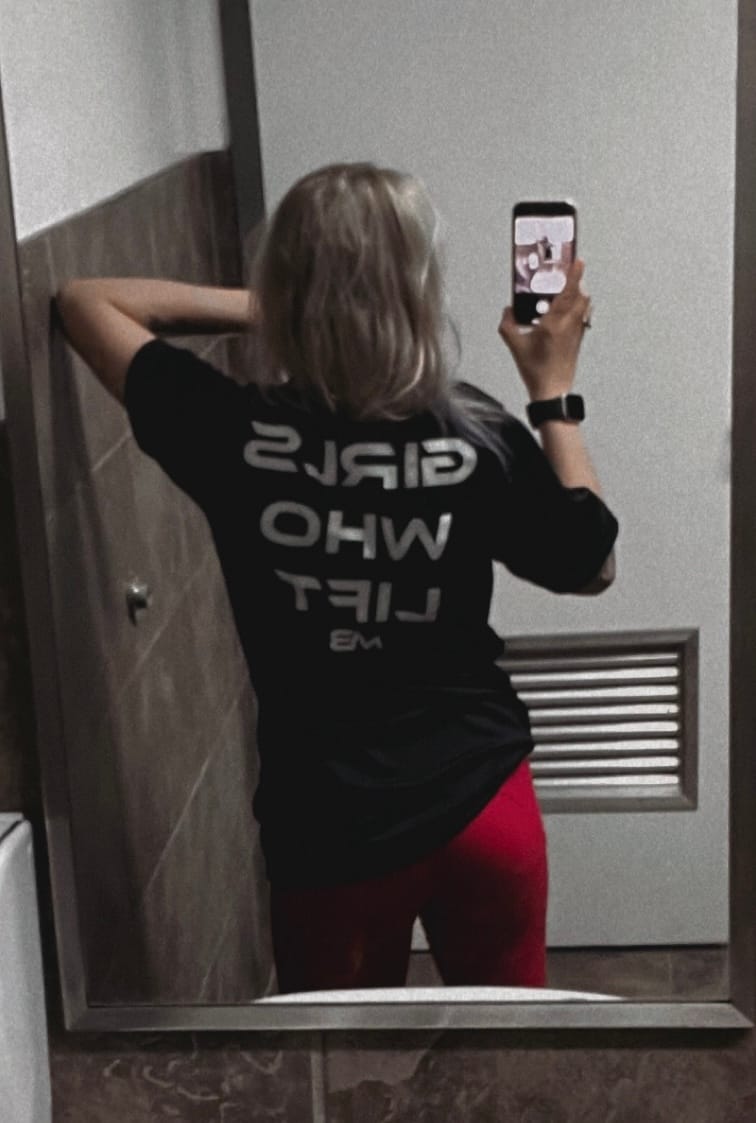 Customer photo review of "Girls Who Lift" Performance Unisex Tee