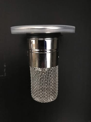 Customer photo review of Bouchon lavabo avec panier filtrant