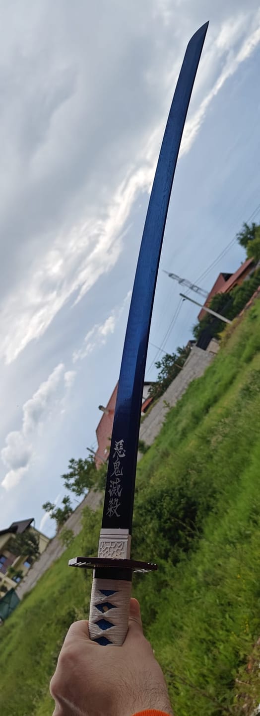 Customer photo review of The Giyuu Tomioka Handmade Katana Clay Tempered T10 Steel From Demon Slayer