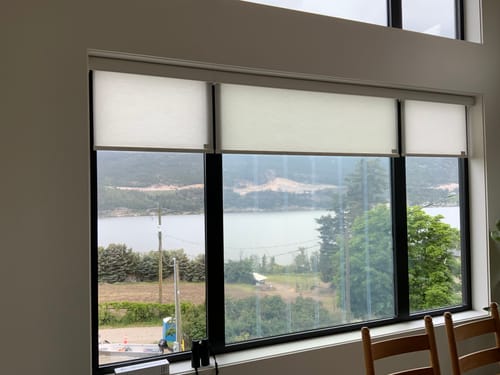 Customer photo review of SmartWings Motorized Light Filtering Roller Shades 70% Blackout Safari