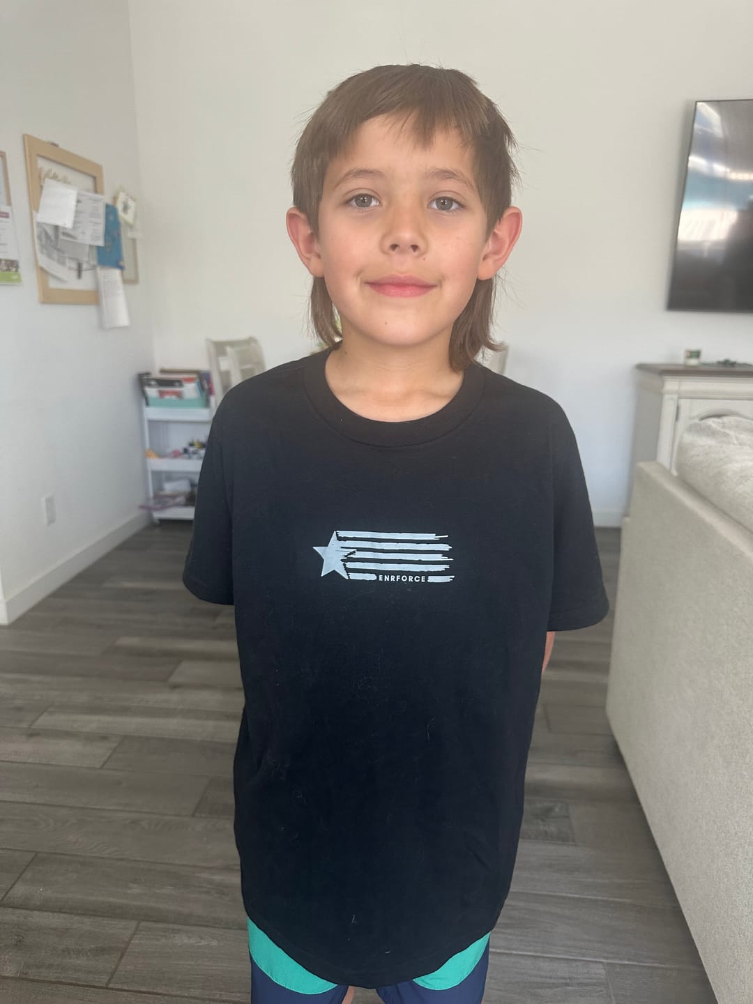 Customer photo review of Youth Enrforce Tee