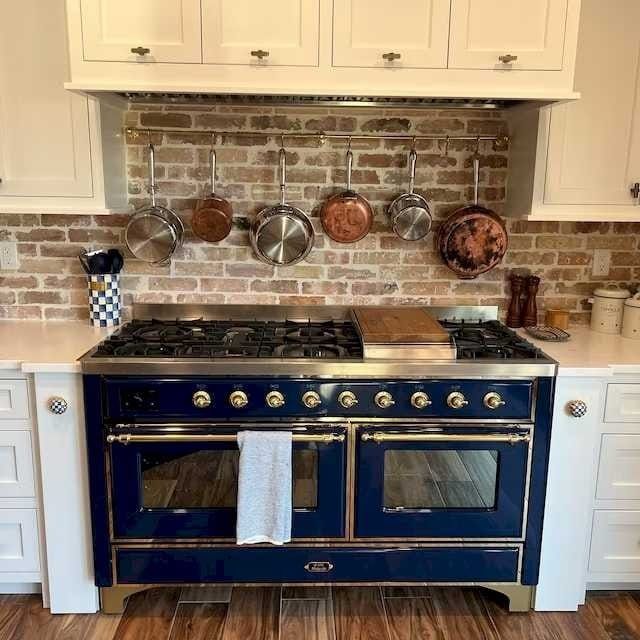 Customer photo review of Unlacquered Brass Wall Mounted Pot Rack With Hooks