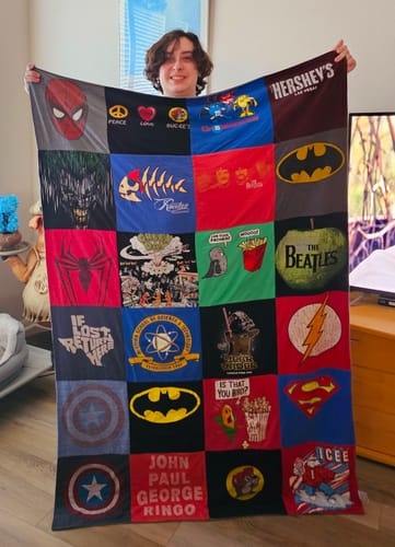T-shirt quilt with superheroes, music themes by Jodi from TX
