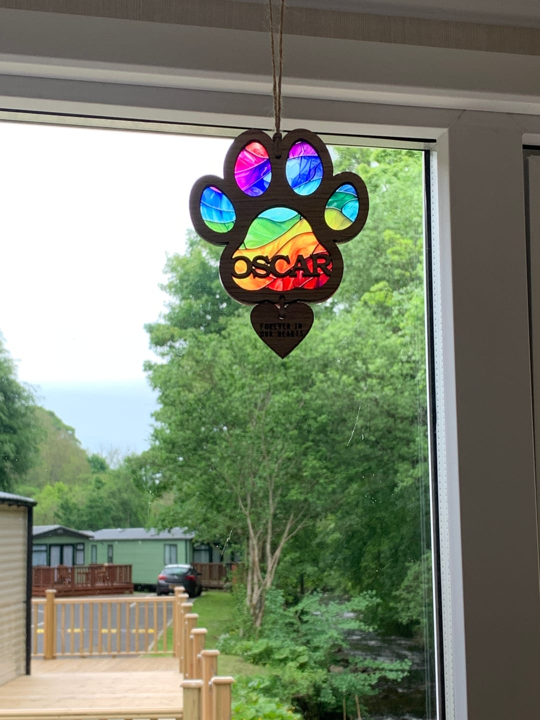 Customer photo review of Rainbow Dog Paw Stained Glass
