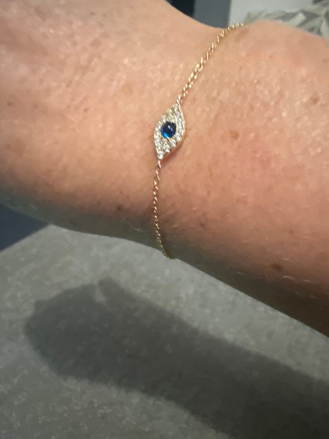 Customer photo review of Evil Eye Pave Chain Bracelet