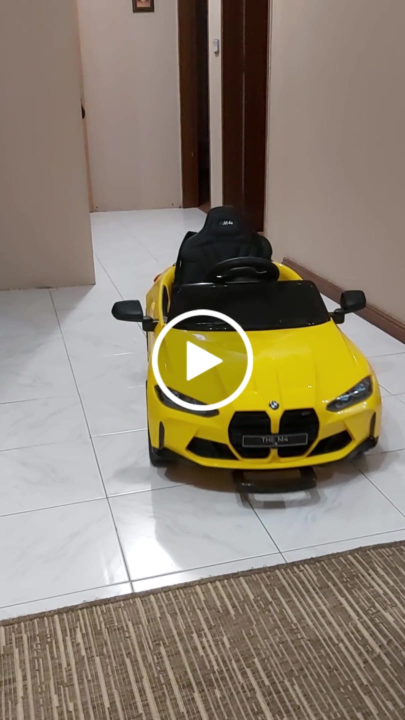 Customer video review of Carro Elétrico para Criança BMW M4 12v Amarelo c/ RODAS DE BORRACHA & ASSENTO EM PELE