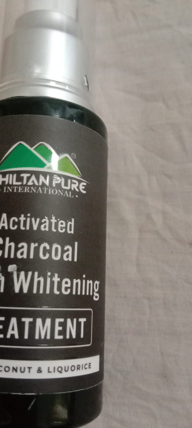 Customer photo review of Activated Charcoal Teeth 🦷 Whitening Treatment - Whitens Teeth Naturally, Kills Cavity causing Bacteria & Eliminates Bad Breath