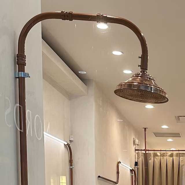 Customer photo review of Unlacquered Copper Showerhead - Natural Copper Rain Shower Head