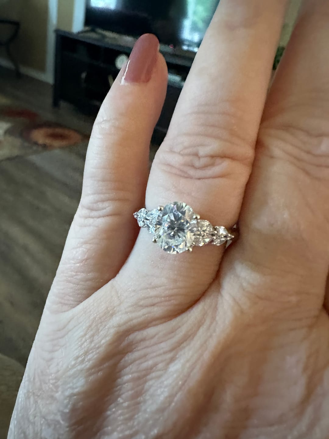 Customer photo review of Oval Cut Moissanite With Marquise Cluster Engagement Ring
