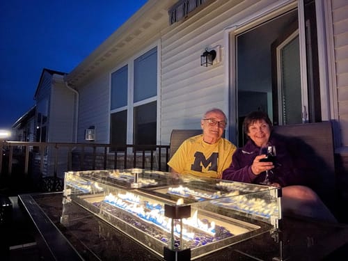 Customer photo review of 44 in Outdoor Propane Gas Fire Pit Table with Glass Wind Guard, Dark Brown