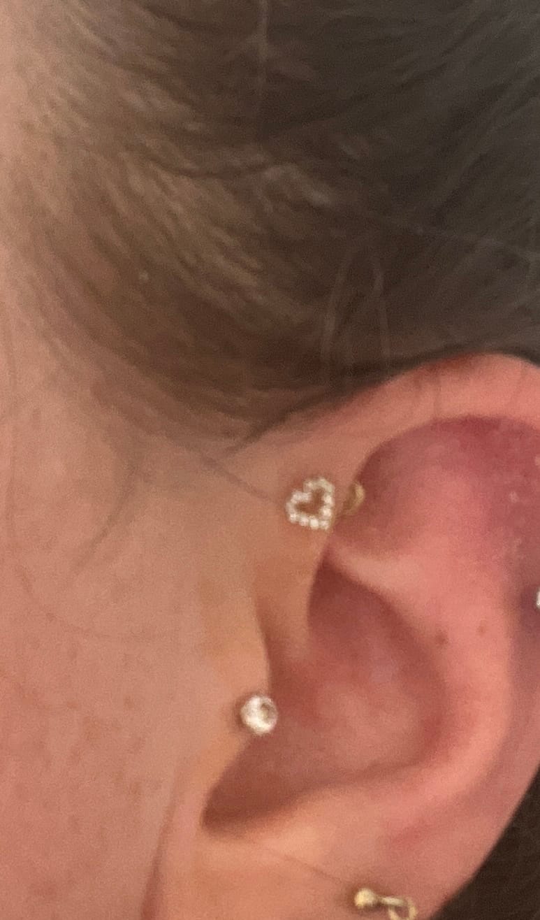 Customer photo review of Heart Piercing | Titan