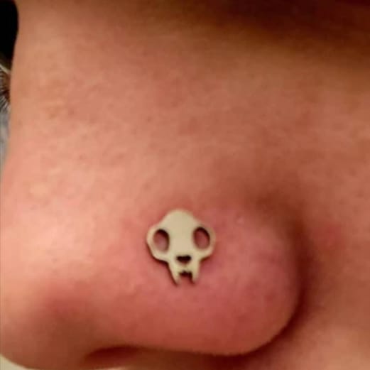 Customer photo review of Cat Skull Silhouette Nose Stud + Earring