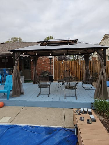 Customer photo review of EROMMY Patio Hardtop Gazebo 10x13ft Double-Roof Aluminum Gazebos w/ Netting & Curtains